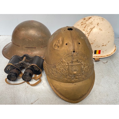 391 - A WWII Zuckerman Home Defence helmet marked ‘AMC 5 1941’, together with a white painted M1 helmet wi... 