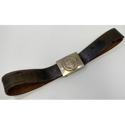 560 - A 1930's leather Hitler Youth belt, the buckle with Reichsadler, Swastika and Blut und Ehre to centr... 