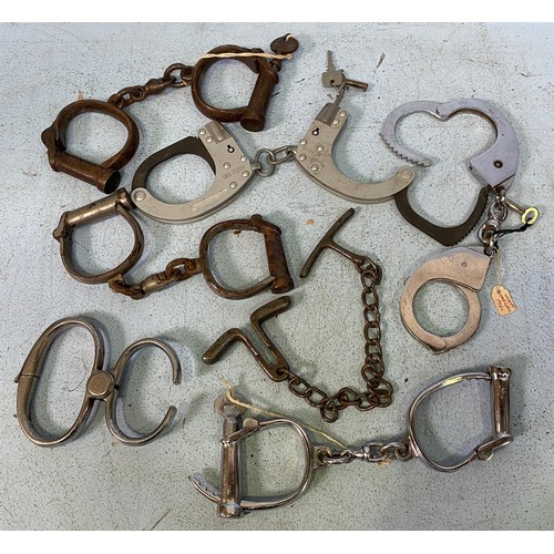 553 - Seven various pairs of Police handcuffs, by Hiatt and others