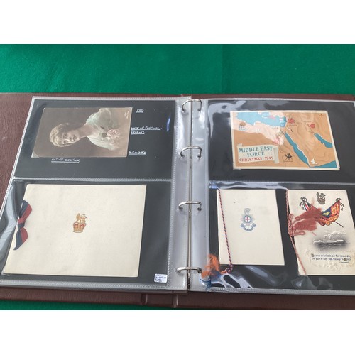 162 - Four albums – two containing more than 210 Christmas themed postcards, with a number featuring Fathe... 