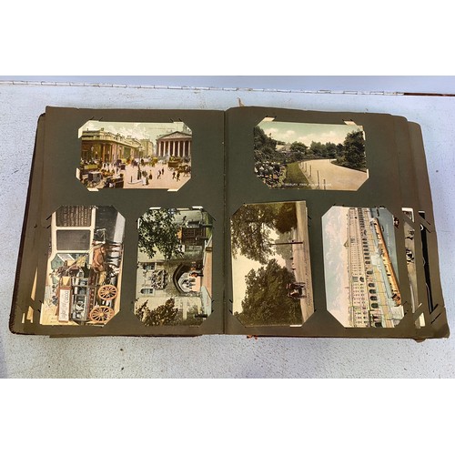 172 - An Edwardian postcard album, containing approximately 130 postcards, mostly topographical, monochrom... 