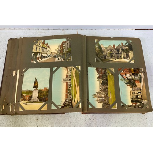 172 - An Edwardian postcard album, containing approximately 130 postcards, mostly topographical, monochrom... 