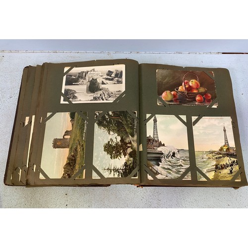 172 - An Edwardian postcard album, containing approximately 130 postcards, mostly topographical, monochrom... 