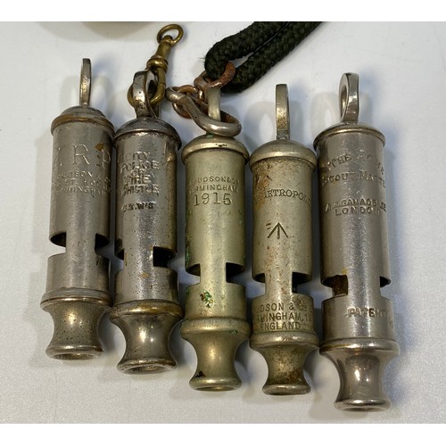 554 - Five various whistles including ARP by Huddson, City police or Fire Whistle, The Scout Master, Metro... 