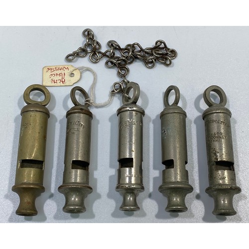 555 - Five various whistles including a WW1 Huddson No.1 dated 1917 with broad arrow, ACME City, ARP and 2... 