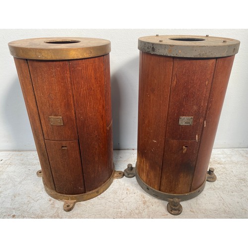 496 - Two early 20th century ships binnacle compass stands, of cylindrical form with teak panel with metal... 