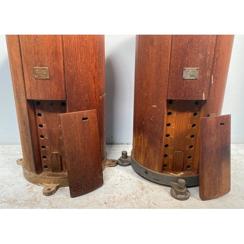 496 - Two early 20th century ships binnacle compass stands, of cylindrical form with teak panel with metal... 