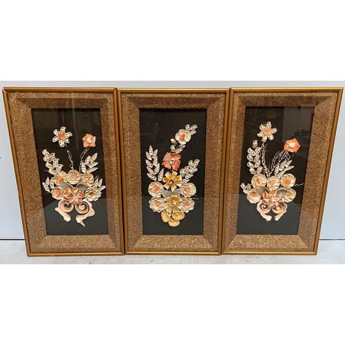 442 - A set of three shell work / sailors valentine style floral dioramas, sand encrusted mounts, glazed a... 