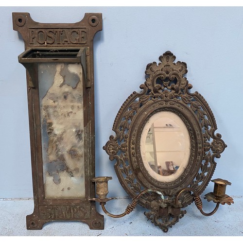 196 - A Victorian brass frame with mirrored panel from a Stamp Vending machine, 41x12.5cm, together with a... 