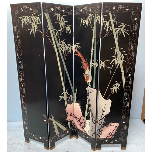 275 - A Chinese four-fold dressing screen in black lacquer decorated with birds and flowers, 185 x 160cm w... 