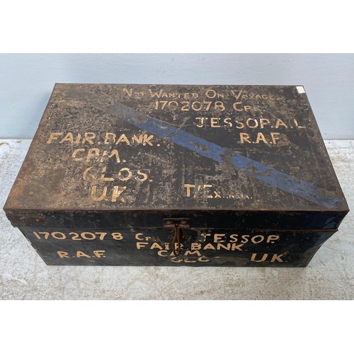 401 - An early 20th century black painted metal military trunk with twin handles, painted in white ‘Not wa... 