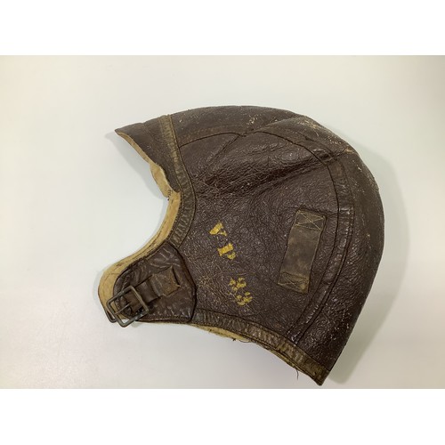 420 - A WWII US Navy pilot's brown leather flying helmet/cap, with sheeps wool lining, (a/f)