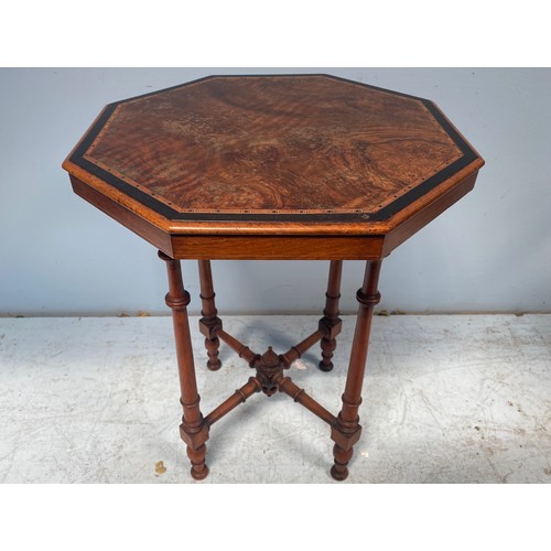 255 - An Edwardian pollard oak veneered octagonal occasional table with central inlaid satinwood, boxwood ... 