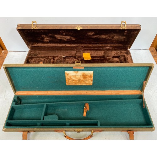 425 - A Browning brown leather shotgun hardcase fitted for over and under 30 ins barrels, together with a ... 