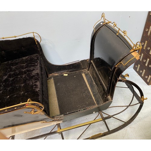 201 - A full size reindeer / horse sled / sleigh with black velvet upholstery and cream, black and gold pa... 