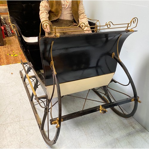 201 - A full size reindeer / horse sled / sleigh with black velvet upholstery and cream, black and gold pa... 