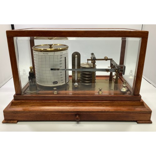 430 - A Russell barograph in oak case with central frieze drawer containing charts, thermometer, bevelled ... 