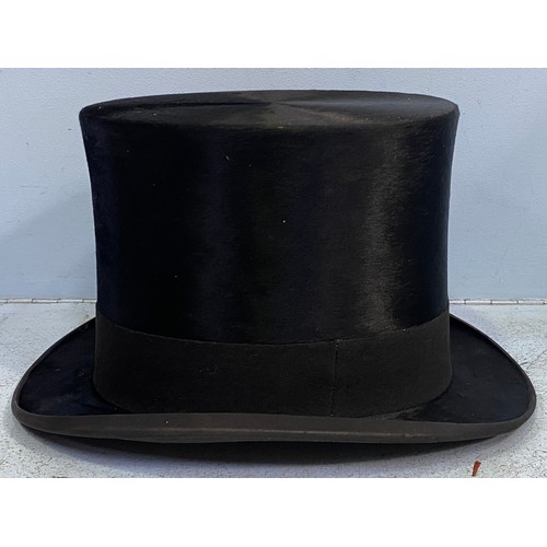 184 - A vintage black silk top hat by Andre & Co. Ltd. Hatters, 163 Piccadilly, W. Andres Superfine, appro... 