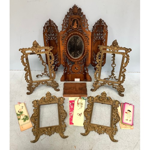 200 - Two pairs of figural brass easel photo frames, 30cm high, together with a Dutch wooden fold out mirr... 