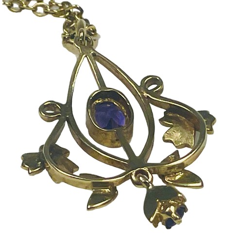 125 - A 9ct yellow gold pendant set with an oval amethyst to the centre, with seed pearls set to the stems... 