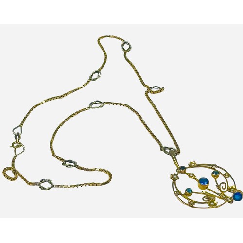 126 - A circular yellow metal pendant, set with blue stones and seed pearls, suspended on a 9ct yellow and... 