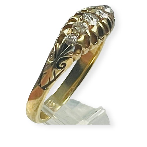 130 - An 18ct yellow gold ring, set with five small old cut diamonds, in a gypsy style setting, estimated ... 