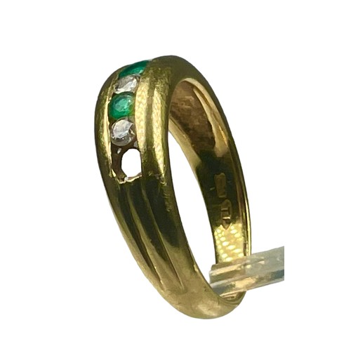 85 - An 18ct yellow gold emerald and diamond ring, channel set with three diamonds and three emeralds, (o... 