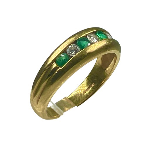 85 - An 18ct yellow gold emerald and diamond ring, channel set with three diamonds and three emeralds, (o... 