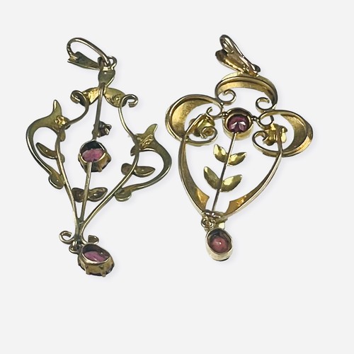 97 - Two 9ct gold pendants, set with red faceted stones and seed pearls, in a foliate design, total weigh... 