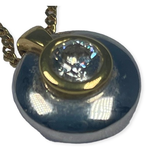 81 - An 18ct white and yellow gold pendant, set with a round brilliant cut diamond to the centre, estimat... 