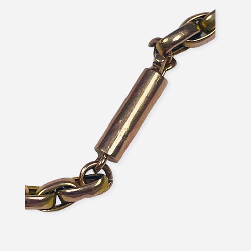 137 - A 9ct yellow gold elongated belcher link chain, weighing 9.3 grams.