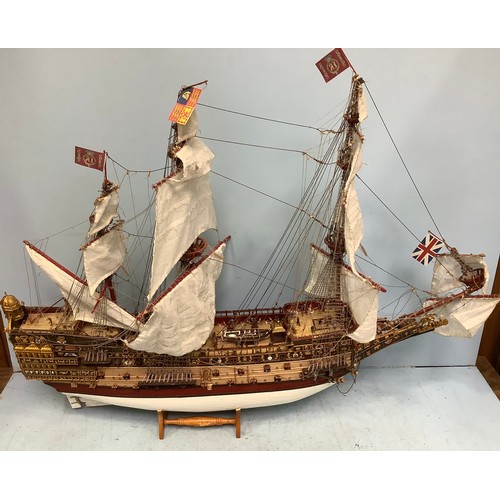 570 - A hand-built model of a fully rigged ship with detailed deck, figures, guns and well painted, 100cm ... 