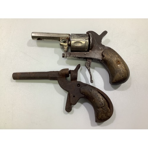 449 - A 19th century .22 rimfire starting pistol, under-barrel vented, six-shot magazine, two-piece pistol... 