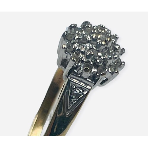 145 - A 9ct yellow gold ring, set with small round diamonds in a cluster design, ring weighs 1.6 grams, fi... 