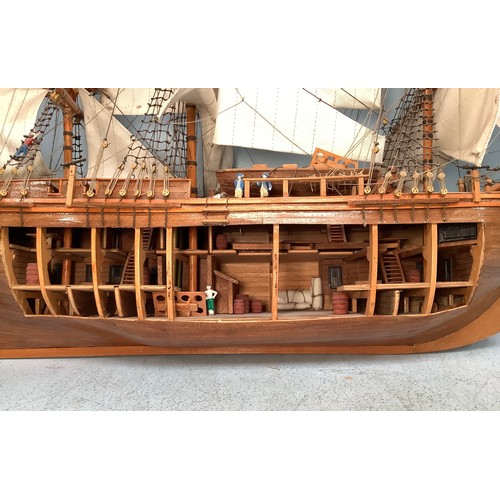 568 - A Del Prado hand-built model ship ‘Bounty’ with detailed and rigging etc. one side open to reveal in... 