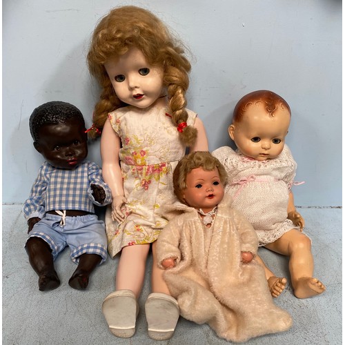 219 - Ten various 1950s dolls including a large Pedigree ‘crying’ baby doll with cinderella shoes, 70cm ta... 