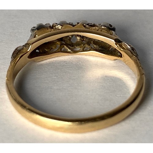 135 - A yellow metal ring, possibly 18ct, set with 4 x Victorian cut diamonds, estimated total weight of d... 