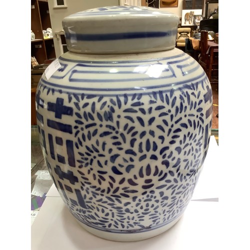 37 - A large Chinese blue and white twin-handled vase, 45cm high, together with a blue and white ginger j... 