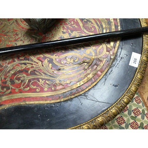 268 - A Victorian ebonised and red tortoiseshell, Boulle worked, shaped oval centre table, with gilt-metal... 