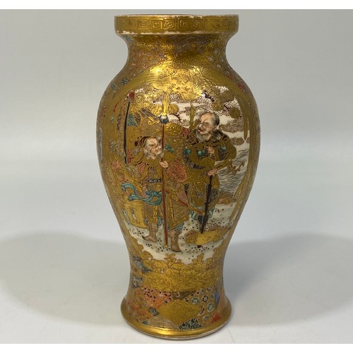 46 - A Japanese Satsuma pottery small baluster vase, with painted and heavily tooled-gilt decoration of w... 