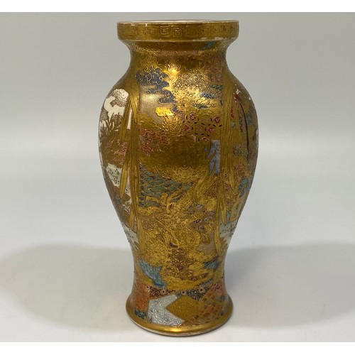 46 - A Japanese Satsuma pottery small baluster vase, with painted and heavily tooled-gilt decoration of w... 