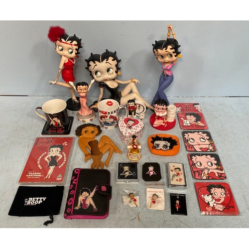 13 - Betty Boop collectables including two King Features Syndicate figurines, one in red flapper dress wi... 