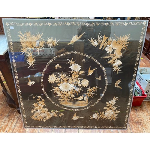 41 - A large square Chinese silk embroidered panel, worked to the centre with autumnal tonal light brown ... 