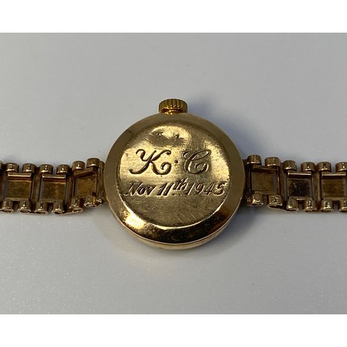 252 - A 9ct gold ladies Vertex Revue wristwatch, the silvered dial with batons denoting hours and Arabic n... 