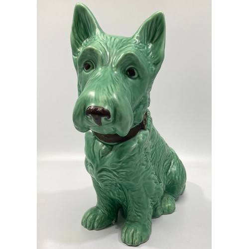 14 - A large green-glazed Sylvac pottery seated terrier