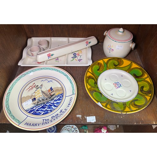 5 - A collection of Poole Pottery including a 'The Ship of Harry Paye' wall plate, Delphis plate, hors d... 