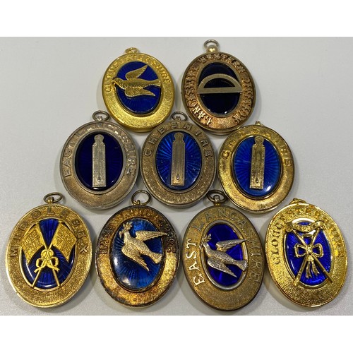 209 - Nine various silver gilt Masonic collar jewels with blue enamelling including East Lancashire x 3, C... 