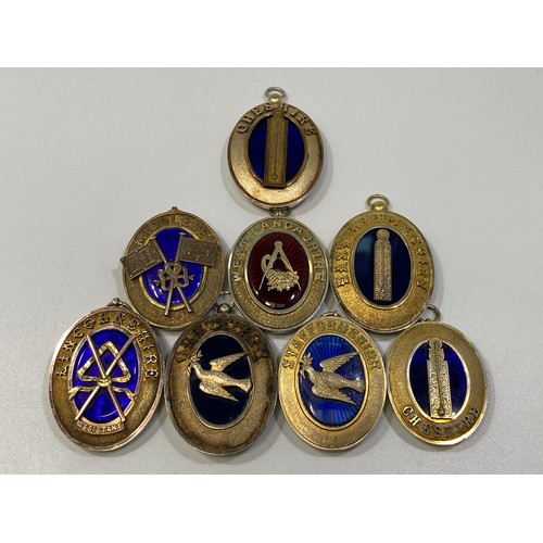 201 - Eight various silver gilt hallmarked Masonic collar jewels with blue enamelling including Cheshire (... 