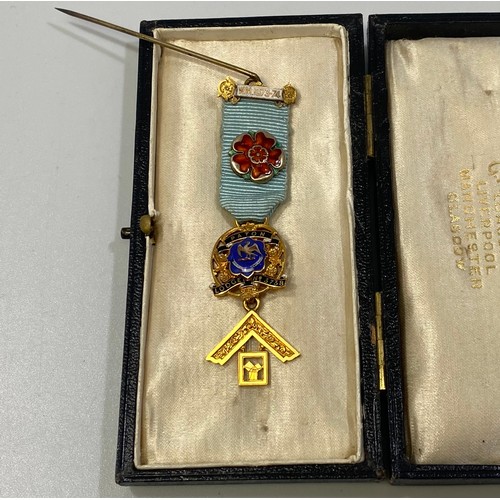 216 - A 9ct gold Masonic jewel for Paton Lodge No. 3738 and bar ‘W.M. 1973-1974’ with poppy badge on blue ... 