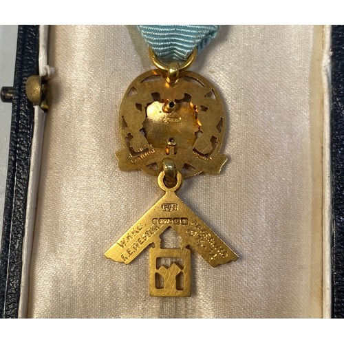 216 - A 9ct gold Masonic jewel for Paton Lodge No. 3738 and bar ‘W.M. 1973-1974’ with poppy badge on blue ... 